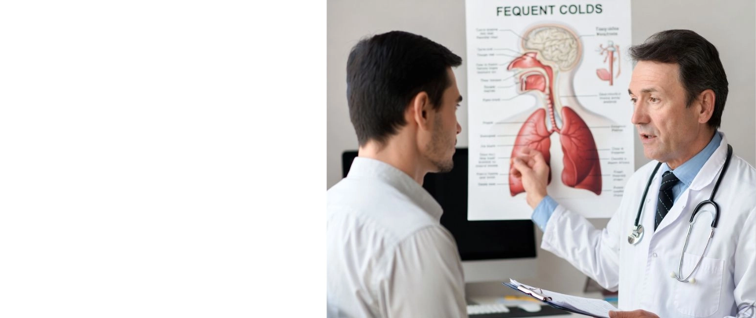 Doctor explaining respiratory system to patient during consultation for frequent colds