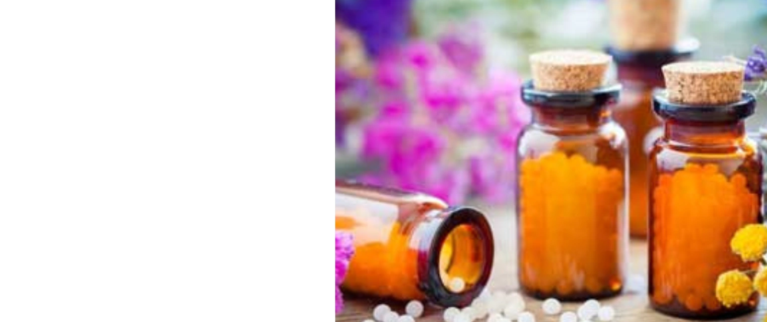 Homeopathic medicine bottles with globules and natural ingredients