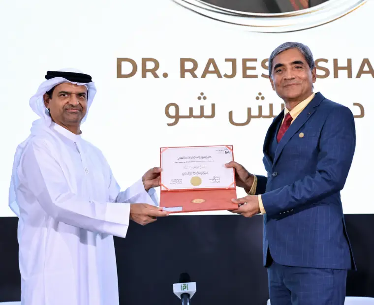 Dr. Rajesh Shah receiving the Sheikh Zayed International Award in Abu Dhabi for his contributions to homeopathic science and COVID-19 research.
